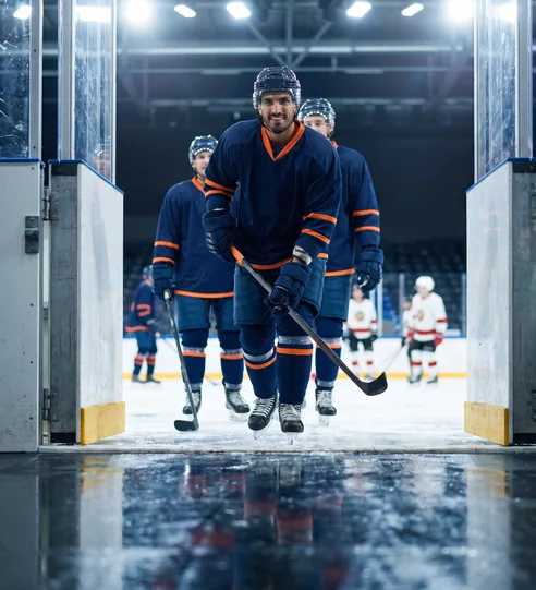 Adult league hockey team stepping onto freshly resurfaced ice
